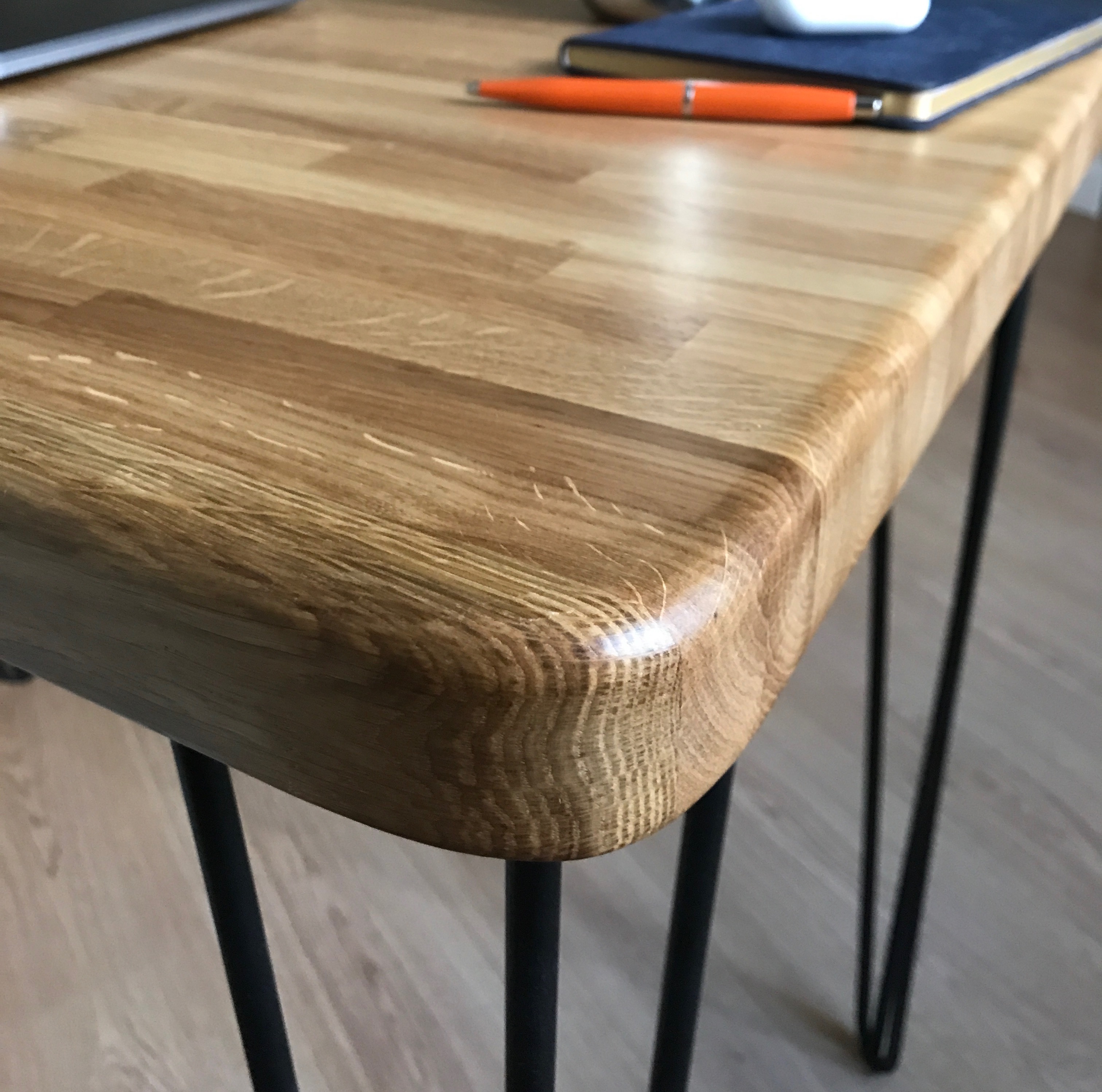 Rounded corner detail of the Touchwood wooden table